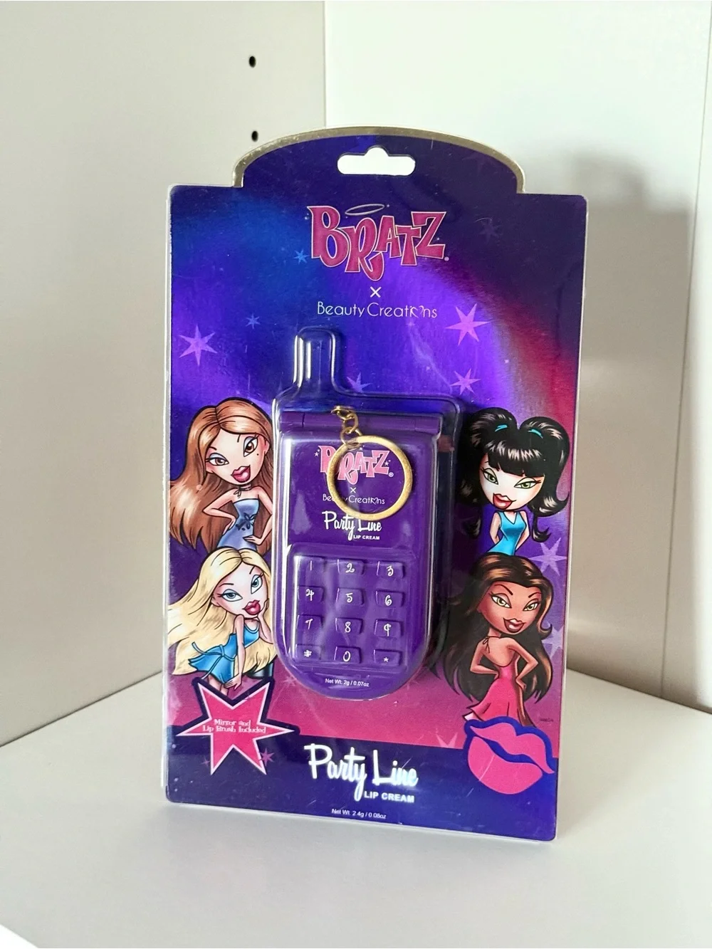 Bratz x Beauty Creations Party Line Lip Cream — Purple Phone-Shaped Balm